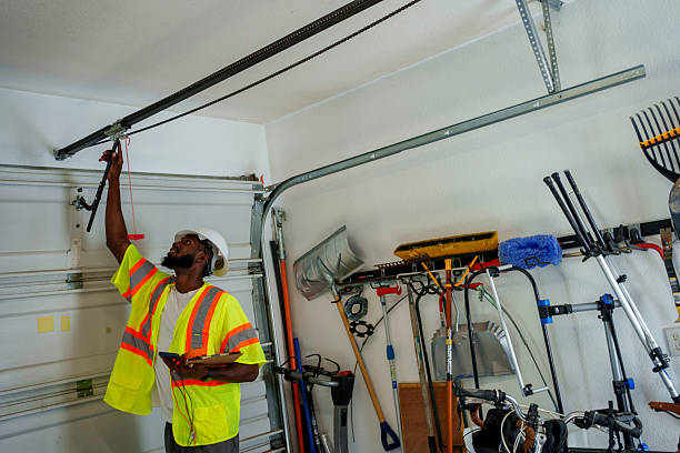 Professional Garage Door Installation technician working in Mineola, NY